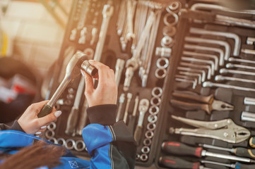 Naklejka premium Keys for car repair in a car workshop