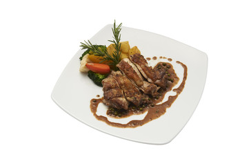 Isolate and clipping path of steak chicken with salad.