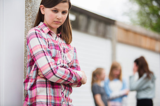 Sad Pre Teen Girl Feeling Left Out By Friends