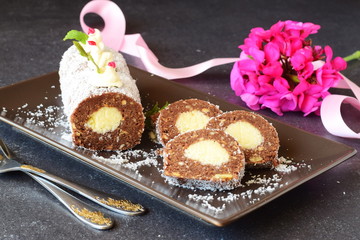 Homemade biscuit roll with coconut filling without baking sliced