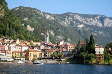Fototapeta na wymiar Waterfront of Varenna at Lake Como in summer, Lombardy Italy 