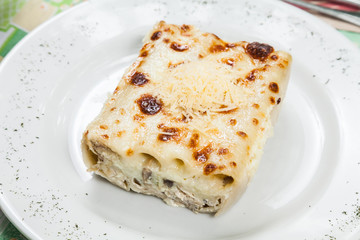 Italian food cannelloni stuffed with chicken