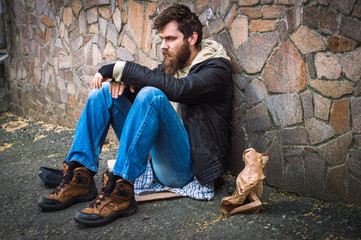 The homeless begs for money