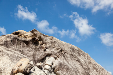 Rock against a blue sky, minimalistic landscape