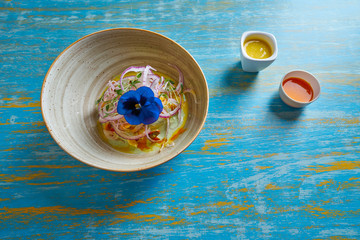 Fish ceviche preuvian recipe and pansy flower