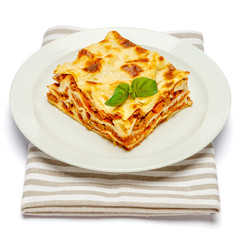 Portion of tasty lasagna isolated on white