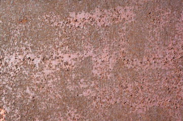 Multicolored peeling wall texture and background. Surface with pimples, brush strokes, stains.