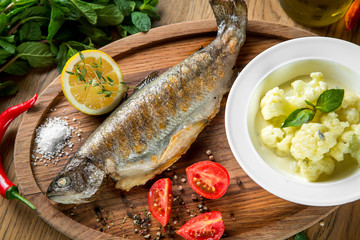 Dorado fish with boiled cauliflower.