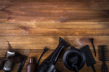 Set of hairdressers on wooden background.  top view