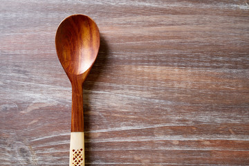 wood spoon on wooden board