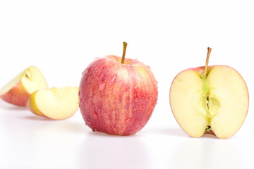 fruit slice of red color apple isolated on white background