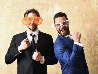 happy and serious bearded men with funny summer eyeglasses