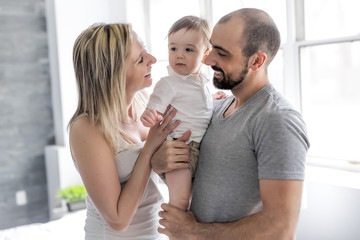 Fototapeta premium nice Happy and fun family in bedroom