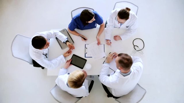 group of doctors on conference at hospital