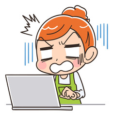 パソコンを見てショックを受けている主婦