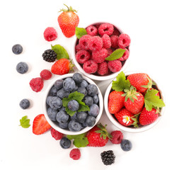 Fototapeta na wymiar berries fruits background.strawberry,blueberry and raspberry