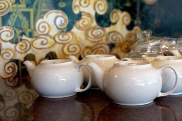 white chinese teapot in restaurant