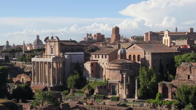 Archaeological area of Roman Forum. An archaeological area of the Roman Forum, crowded with visitors. In the center of Divo Romolo's Temple, on the left Antonino's Temple and Faustina