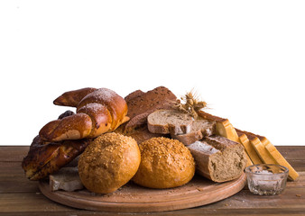Bread and pastries on a wooden background