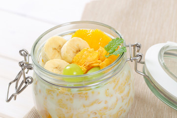 corn flakes with milk and fresh fruit © Viktor