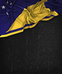 Tokelau Flag Vintage on a Grunge Black Chalkboard With Space For Text