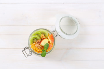 corn flakes with milk and fresh fruit © Viktor