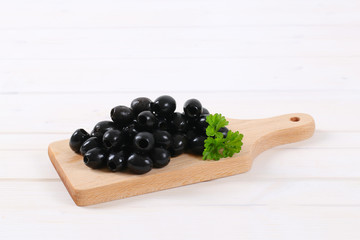 black olives with parsley