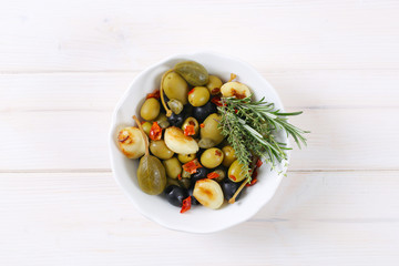 pickled olives, capers, caper berries and garlic