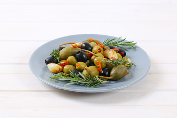 pickled olives, capers, caper berries and garlic