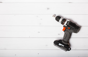 cordless drill and a drill on a white background