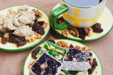 Tea, sweets, halva
