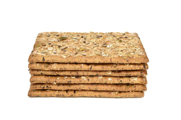 brown crackers topped with seeds