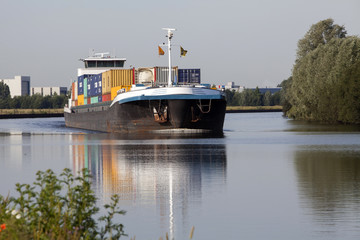 Riverboat, barge Netherlands. Inland shipping. Container ship. Meppelerdiep. Meppel. Zwartsluis. Freightship. - obrazy, fototapety, plakaty