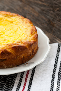 Cheese cake on a wooden table
