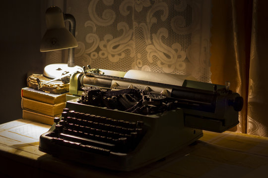 old typewriter at night with low light