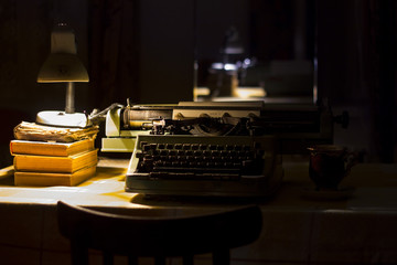 old typewriter at night with low light