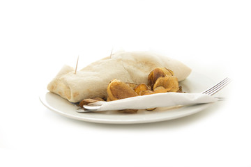 Tortilla served on white background