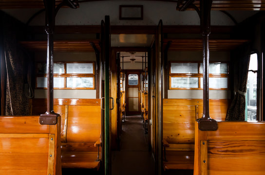 wooden interior of an italian Carrozza Centoporte, early XX century compartment coach for third class passenger trains 