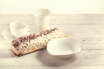 White ware and meringue dessert
