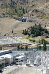power transmission station near river in summer day