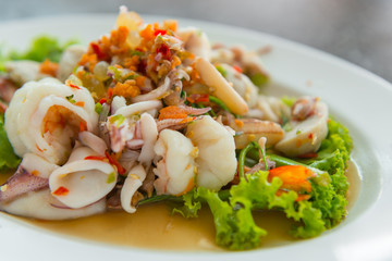 Thai spicy seafood salad. (Thai cuisine)