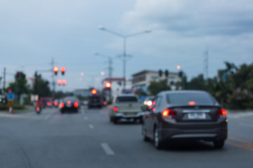 Fototapeta na wymiar light of traffic car on the city street, abstract blur bokeh background