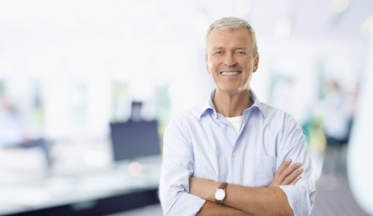 Senior sales man in the office. Shot of a casual marketing manager businessman standing in the...