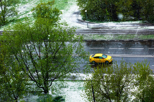 Overhead View Of Moscow City Street Scene With Yellow Taxi Cab