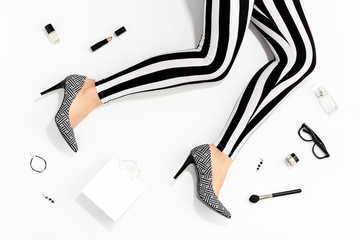 Women legs and fashion stylish accessories top view