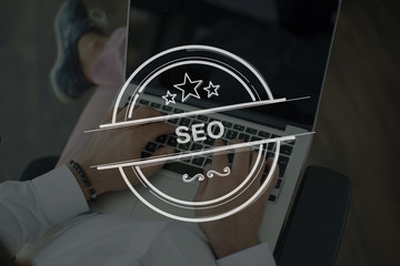 People Using Laptop and SEO Concept