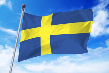 Flag of Sweden developing against a clear blue sky