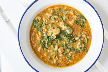 creamy spicy seafood fish soup with coriander