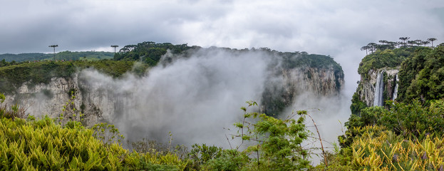 Panoramic view of Itaimbezinho Canyon with fog at Aparados da Serra National Park - Cambara do Sul, Rio Grande do Sul, Brazil