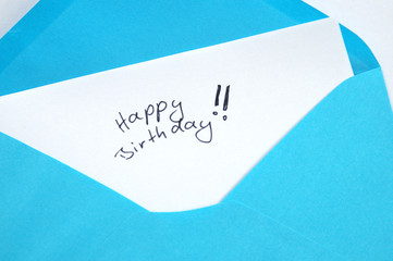 Happy Birthday, handwritten letter in blue envelope
